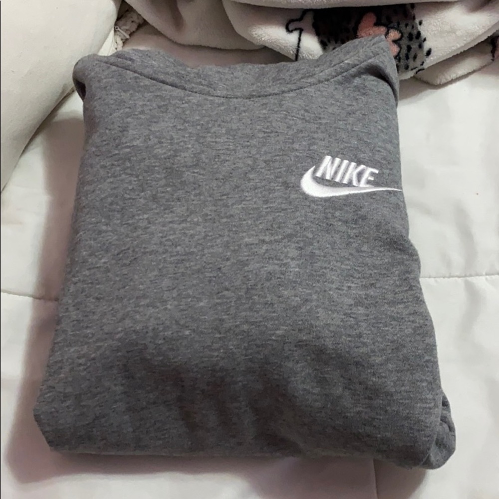 Gray Nike sweater size large in kids